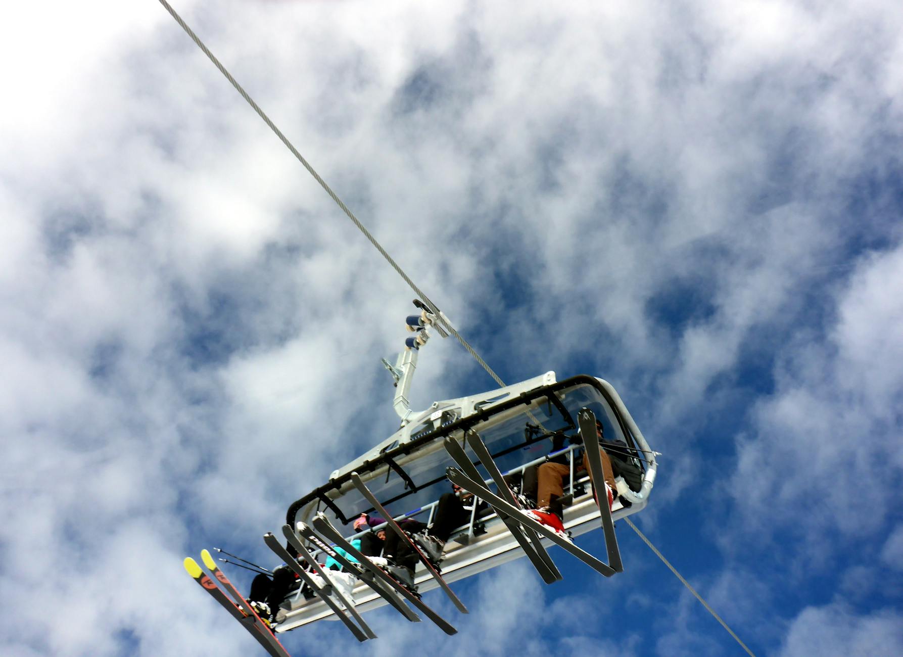 people riding cable car